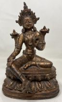 A gilt bronze Buddha, 22 cm high