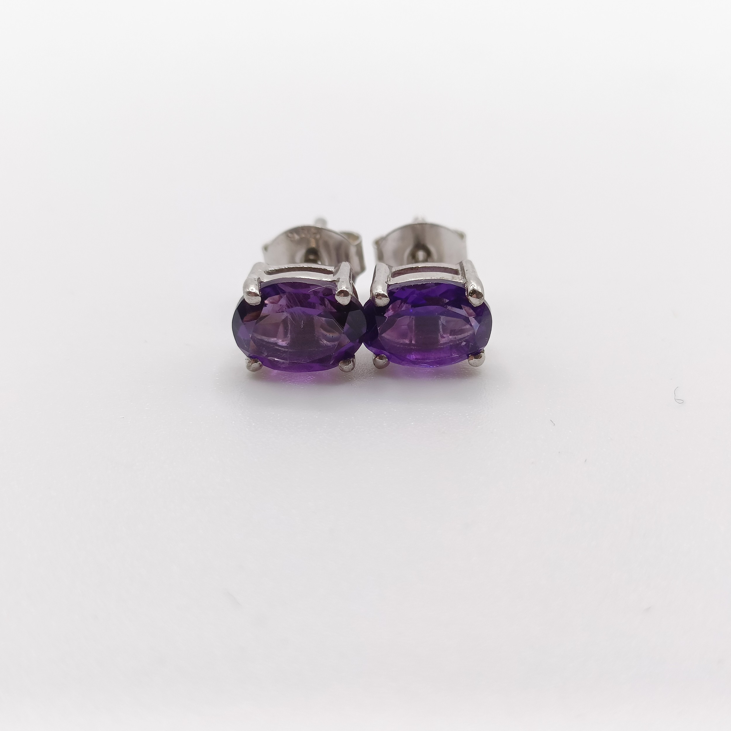 A pair of amethyst studs, in silver - Image 6 of 6