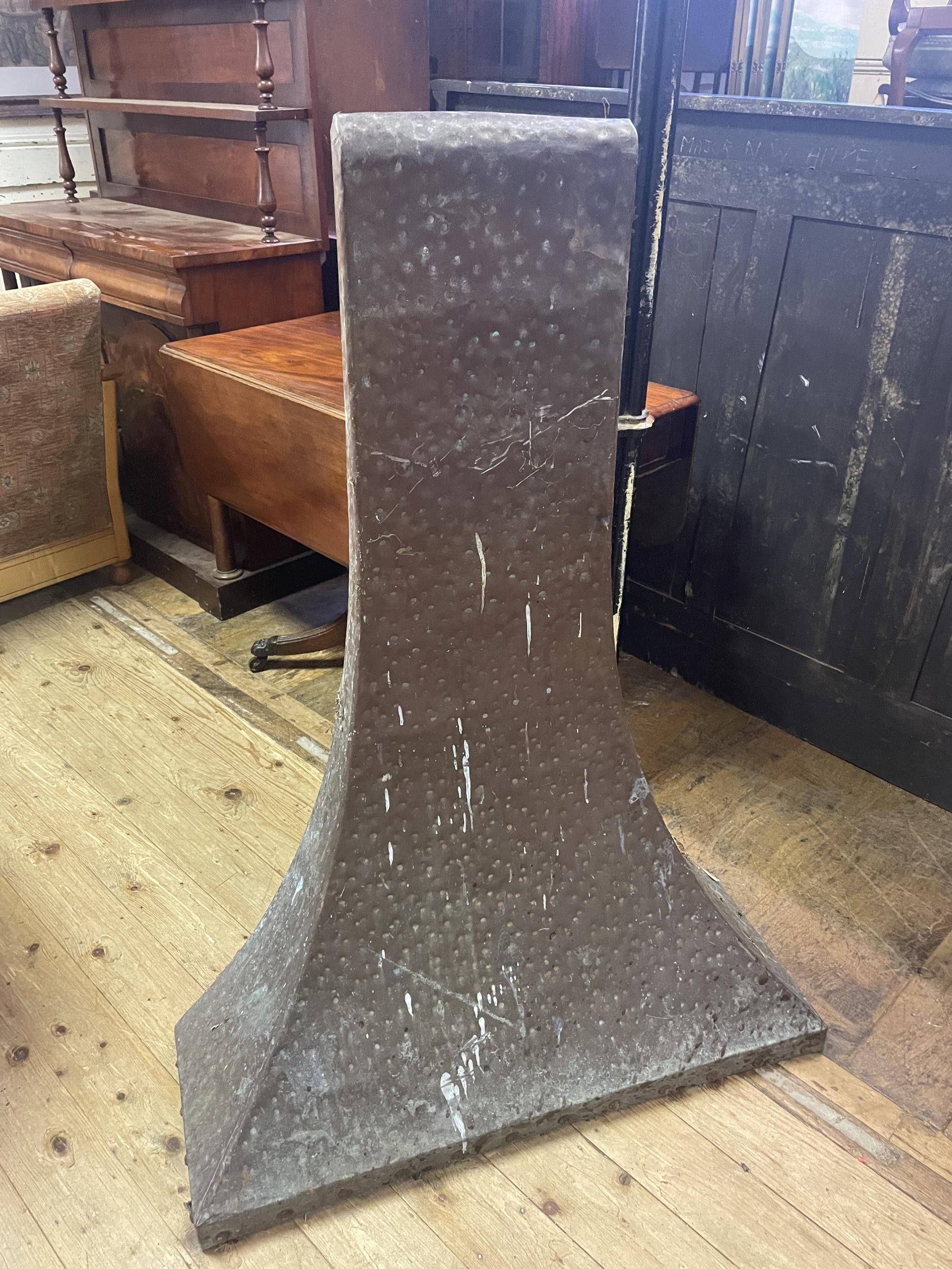 A copper fire hood, 128 cm high, and an oak library table, on turned reeded legs, 175 cm wide