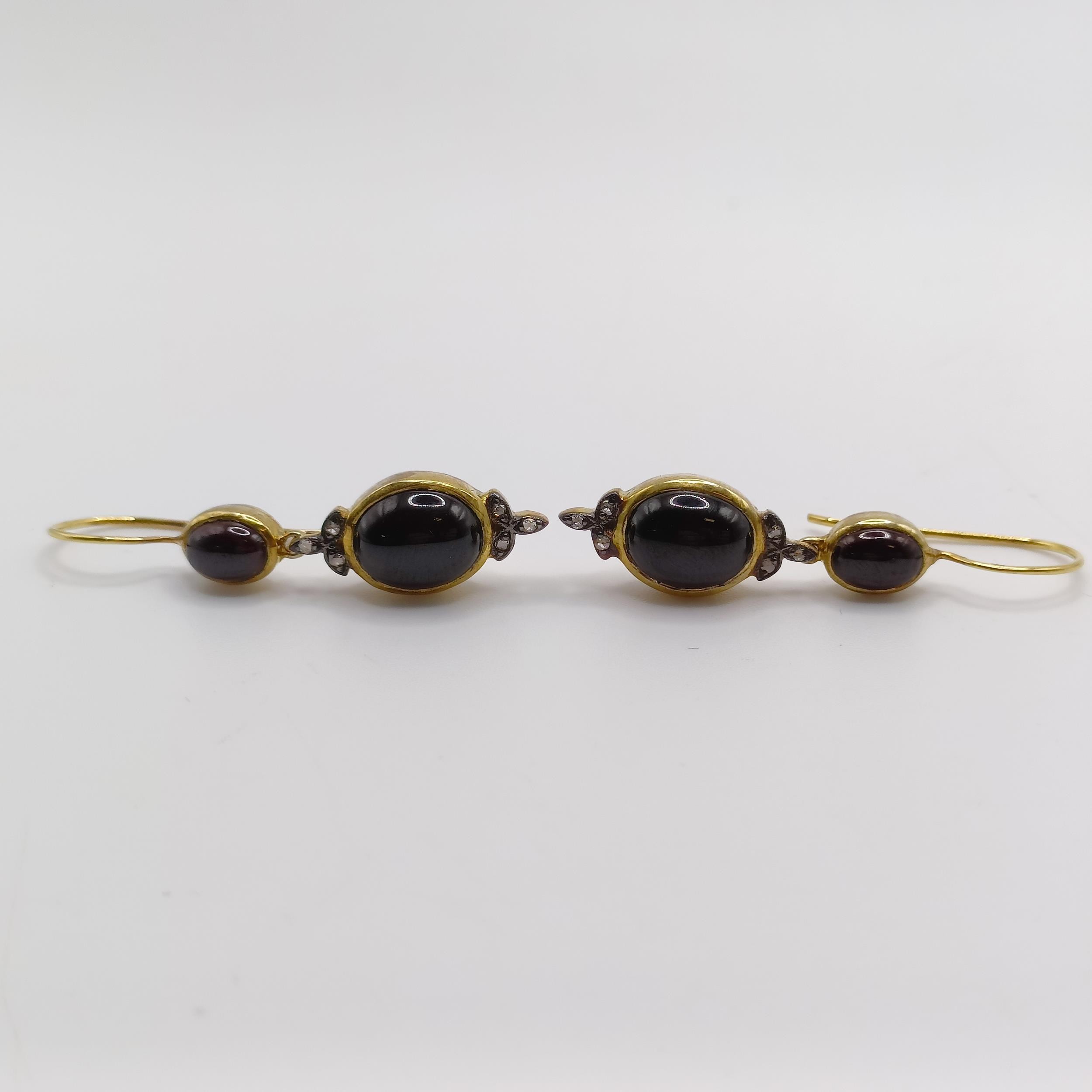A pair of silver and 9ct yellow gold, cabochon garnet and diamond double drop earrings, with hook - Image 2 of 5