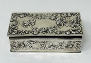 A sterling silver stamp box