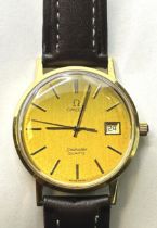 A gentleman's 18ct gold Omega Seamaster Quartz wristwatch, on an associated leather strap