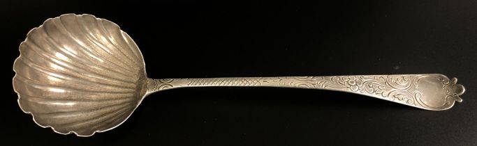 A George III silver punch ladle, with a shell form bowl, by Robert Perth, marks rubbed, 4.9 ozt