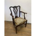 A Chippendale style mahogany armchair, and an oak sideboard (2)