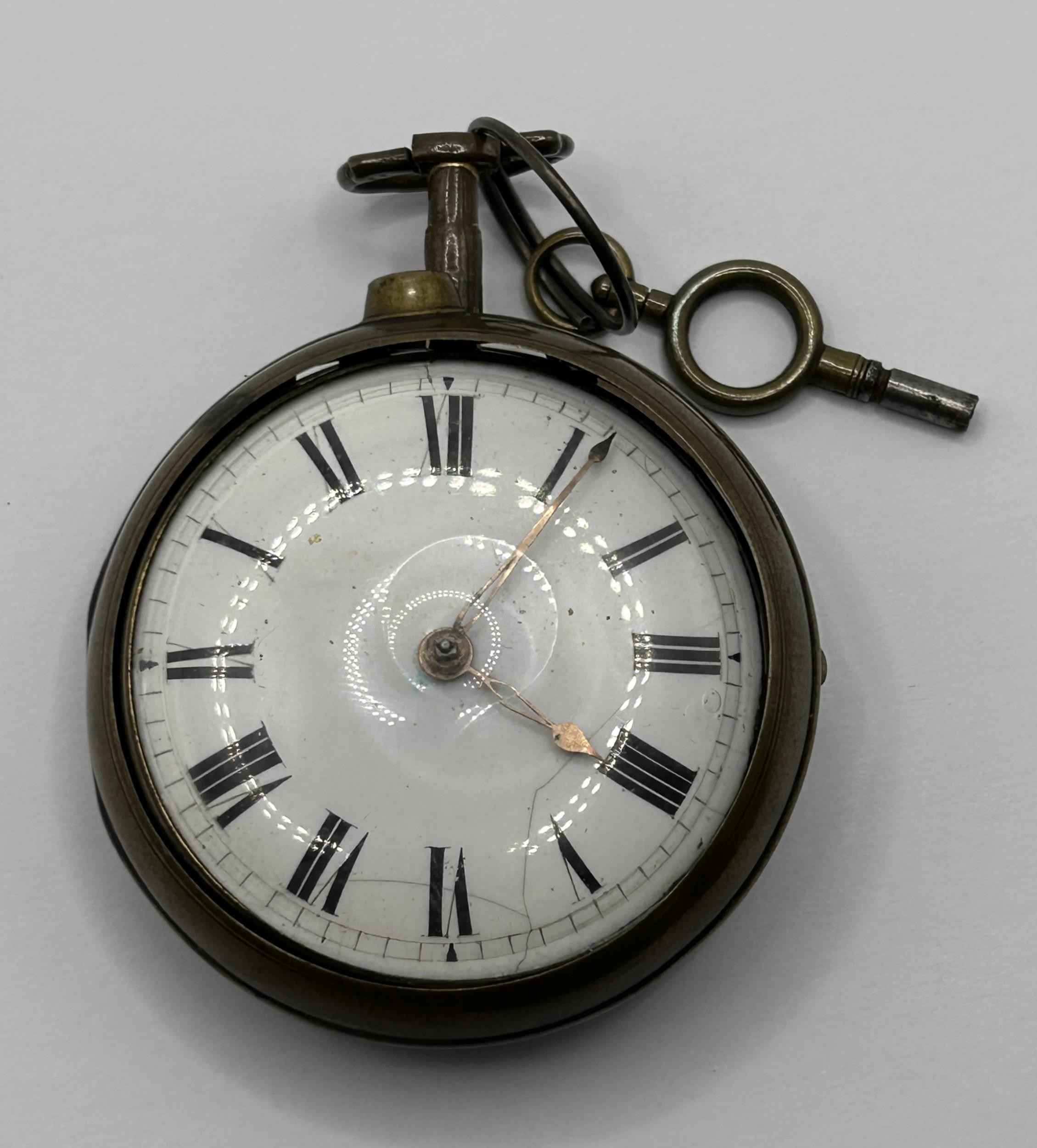An 18th century pair cased pocket watch, the enamel dial with Roman numerals, the movement signed