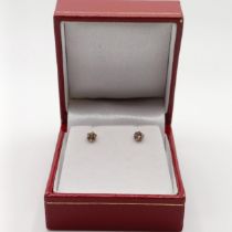 A pair of 18ct white gold 6-claw diamond solitaire studs, with rubber-capped butterflies, boxed, RBC
