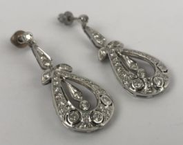 A pair of Edwardian style diamond drop earrings, in a vintage jewellery box