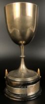 A Victorian silver trophy cup, on an ebonised base, Sheffield 1891, 20 cm high
