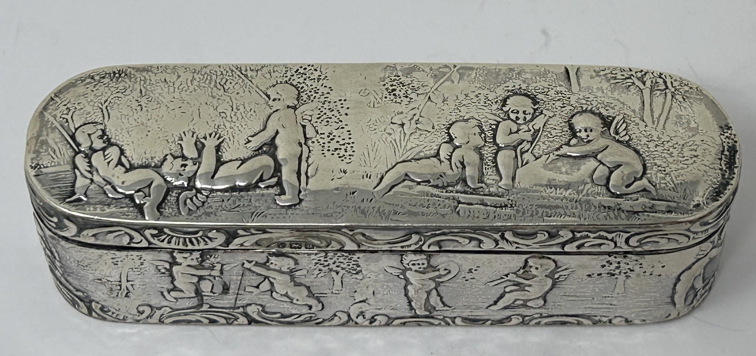 A Continental silver box, decorated children, import marks for 1896, 2.8 ozt - Image 2 of 5