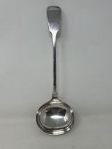 A silver plated fiddle pattern punch ladle