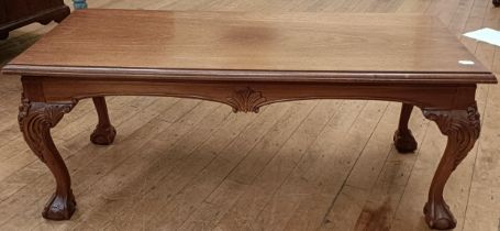 A mahogany low table, on carved cabriole legs with claw and ball feet, 107 cm wide and a painted