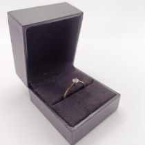 A 9ct white gold and RBC diamond solitaire ring, boxed, diamond 0.25ct, ring size O Box in poor