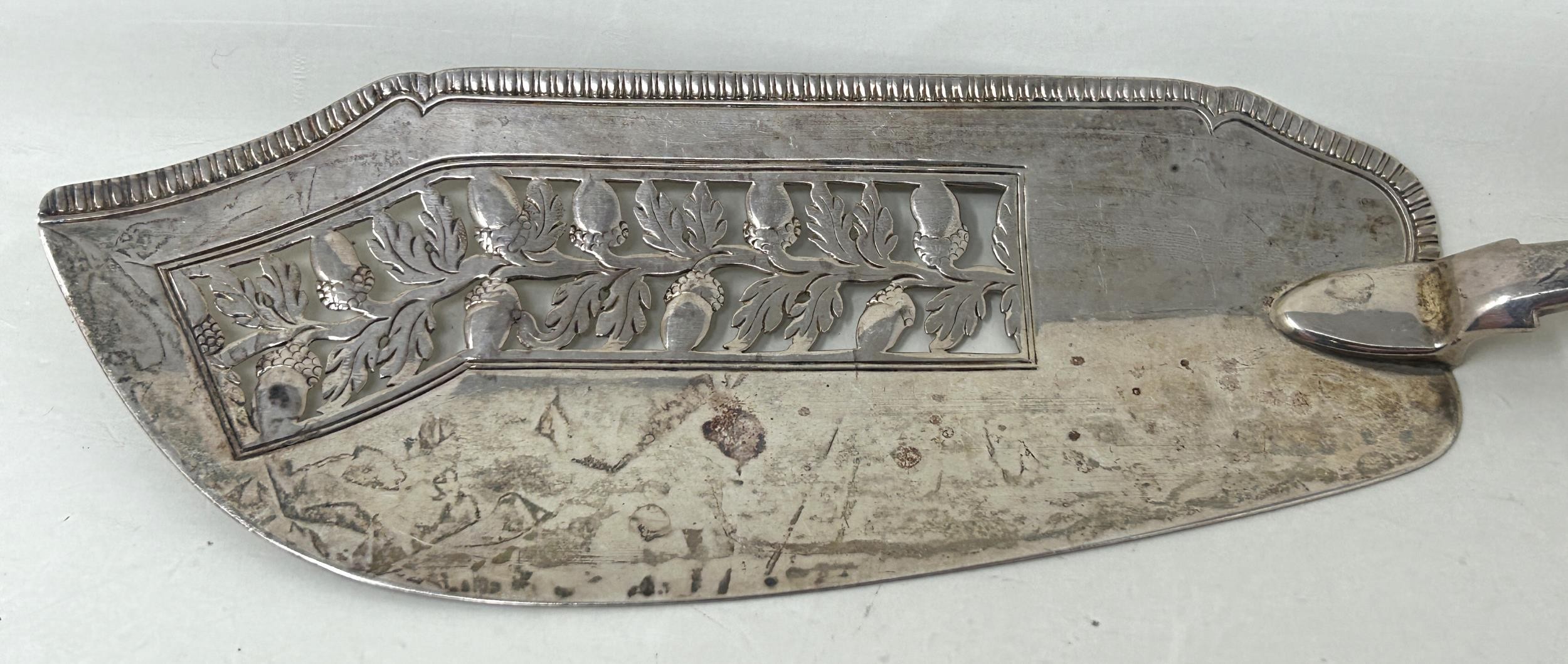 A George III silver fiddle pattern fish slice, with a pierced blade, decorated acorns, London - Image 3 of 5