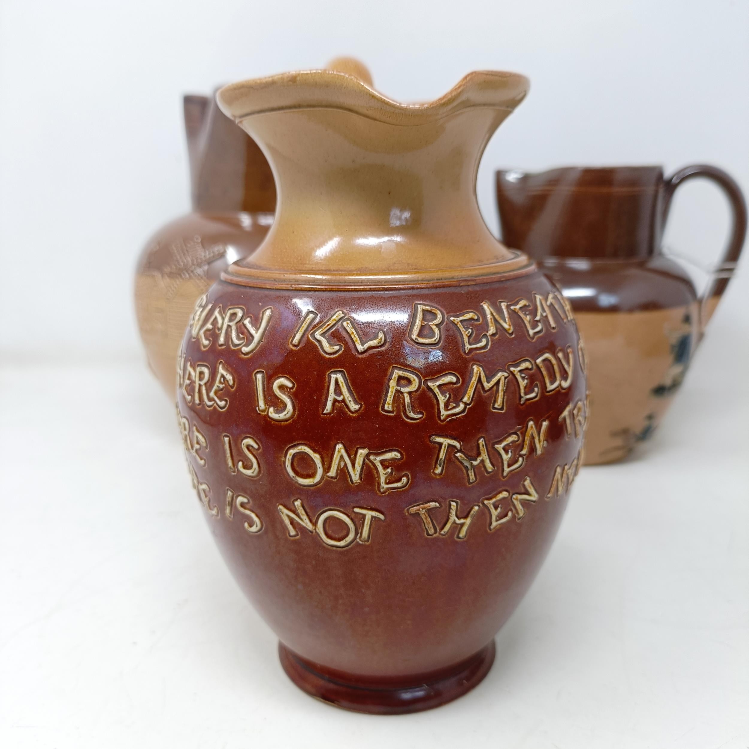 A Doulton Lambeth jug, with a motto, 'For Every Ill Beneath The Sun There Is A Remedy Or None...' 18 - Image 11 of 27