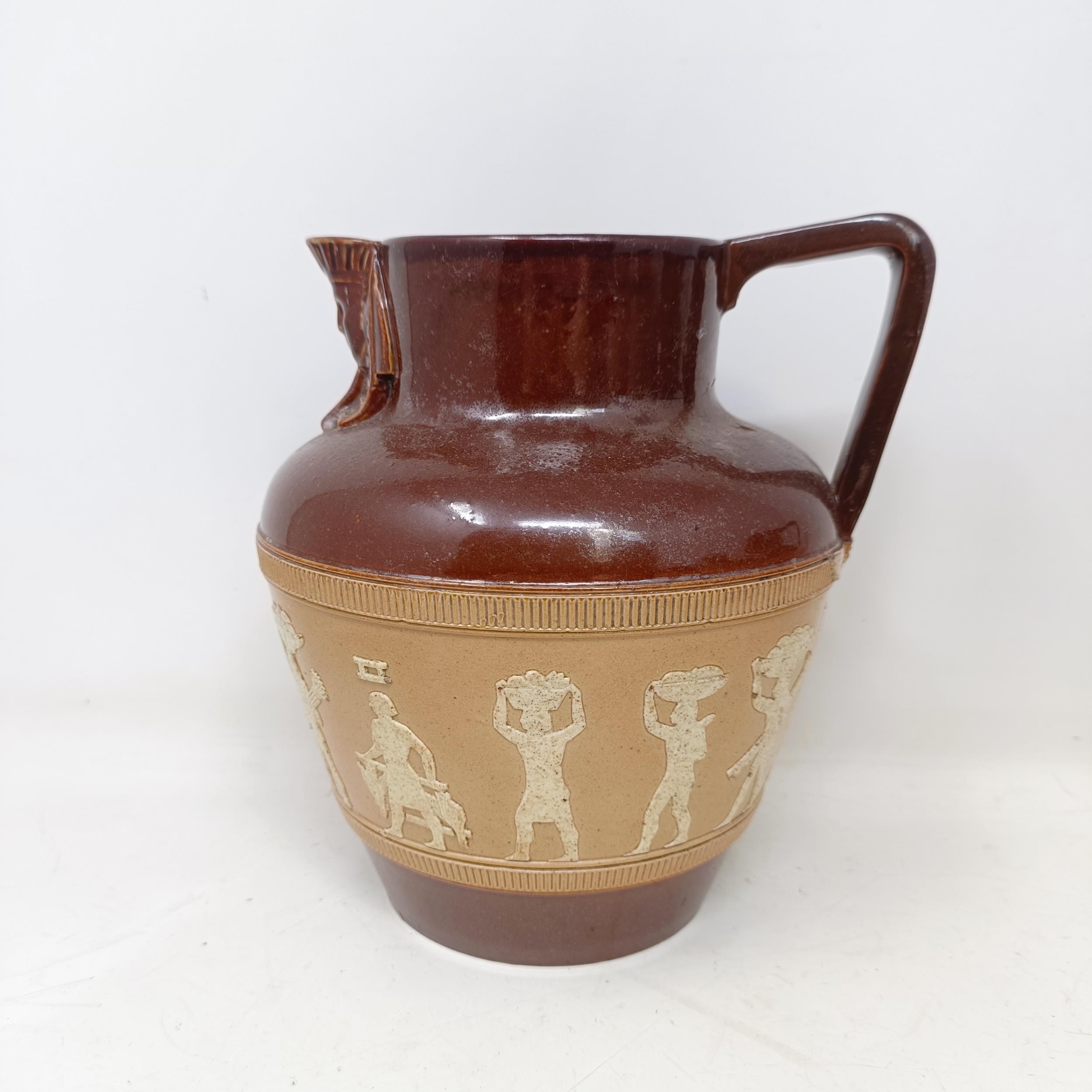 A graduated set of Doulton Lambeth jugs, 20 cm, 18 cm and 14 cm, and another similar, 18 cm (4) - Image 16 of 25