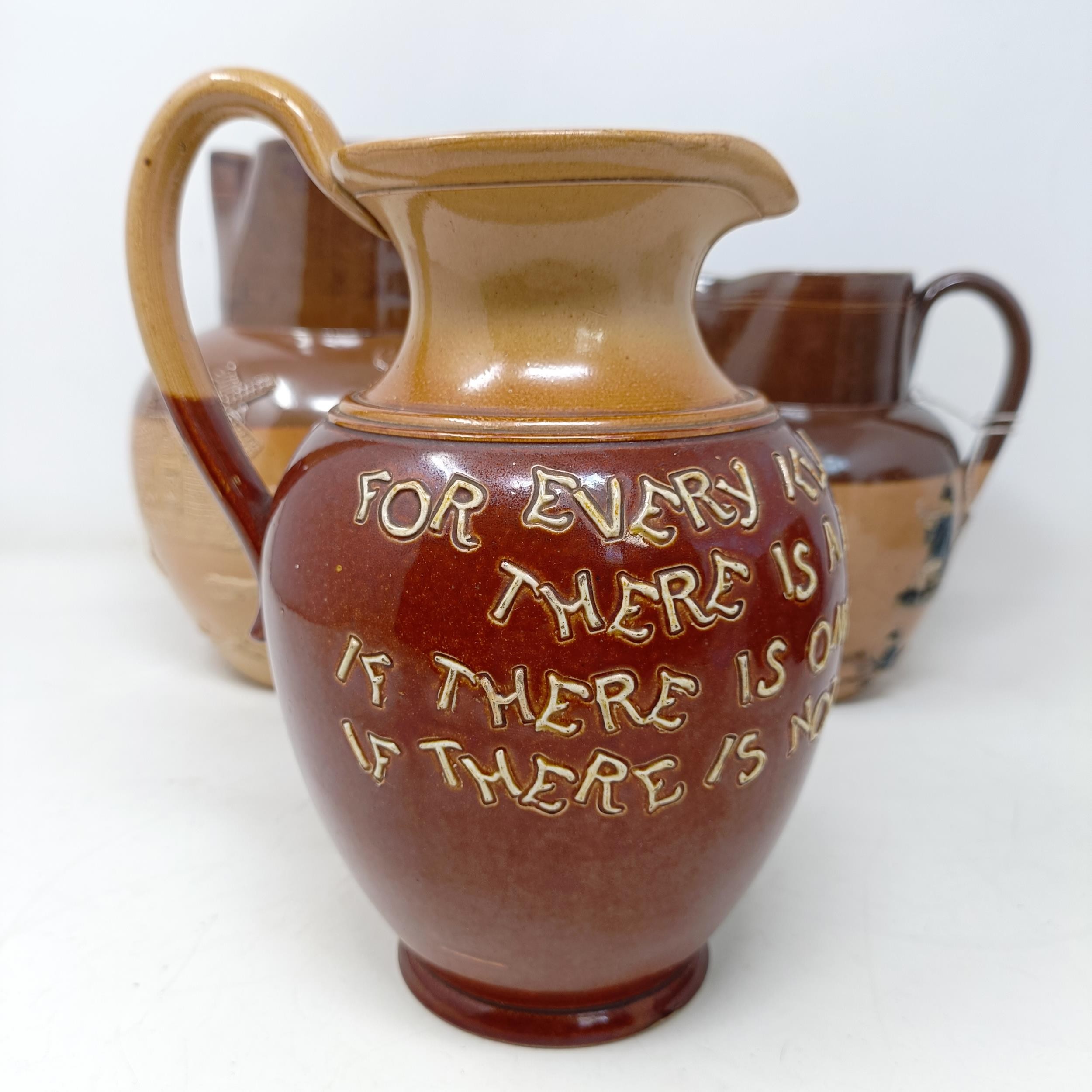 A Doulton Lambeth jug, with a motto, 'For Every Ill Beneath The Sun There Is A Remedy Or None...' 18 - Image 10 of 27