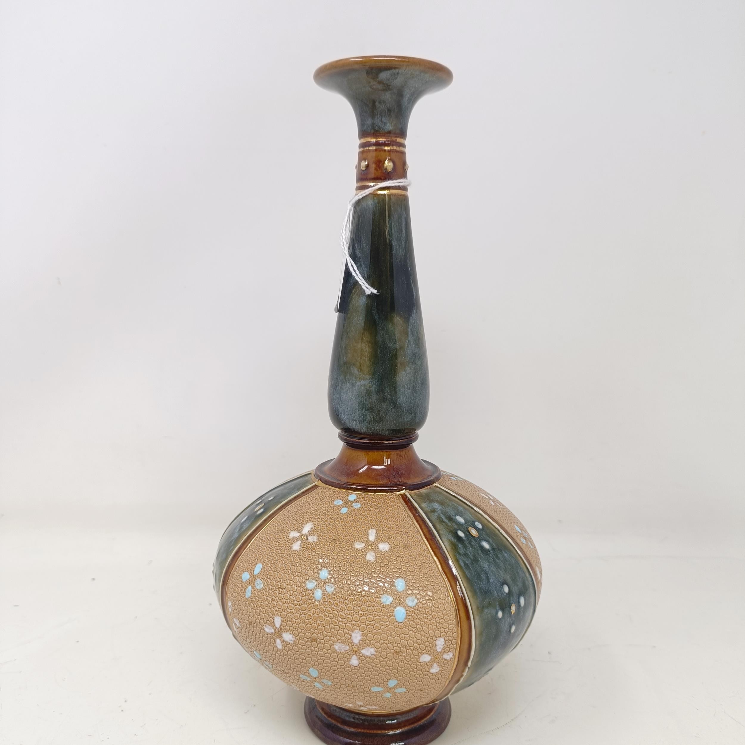 A Royal Doulton vase, by Florrie Jones, decorated flowers, 26 cm high Various firing faults and - Image 2 of 4