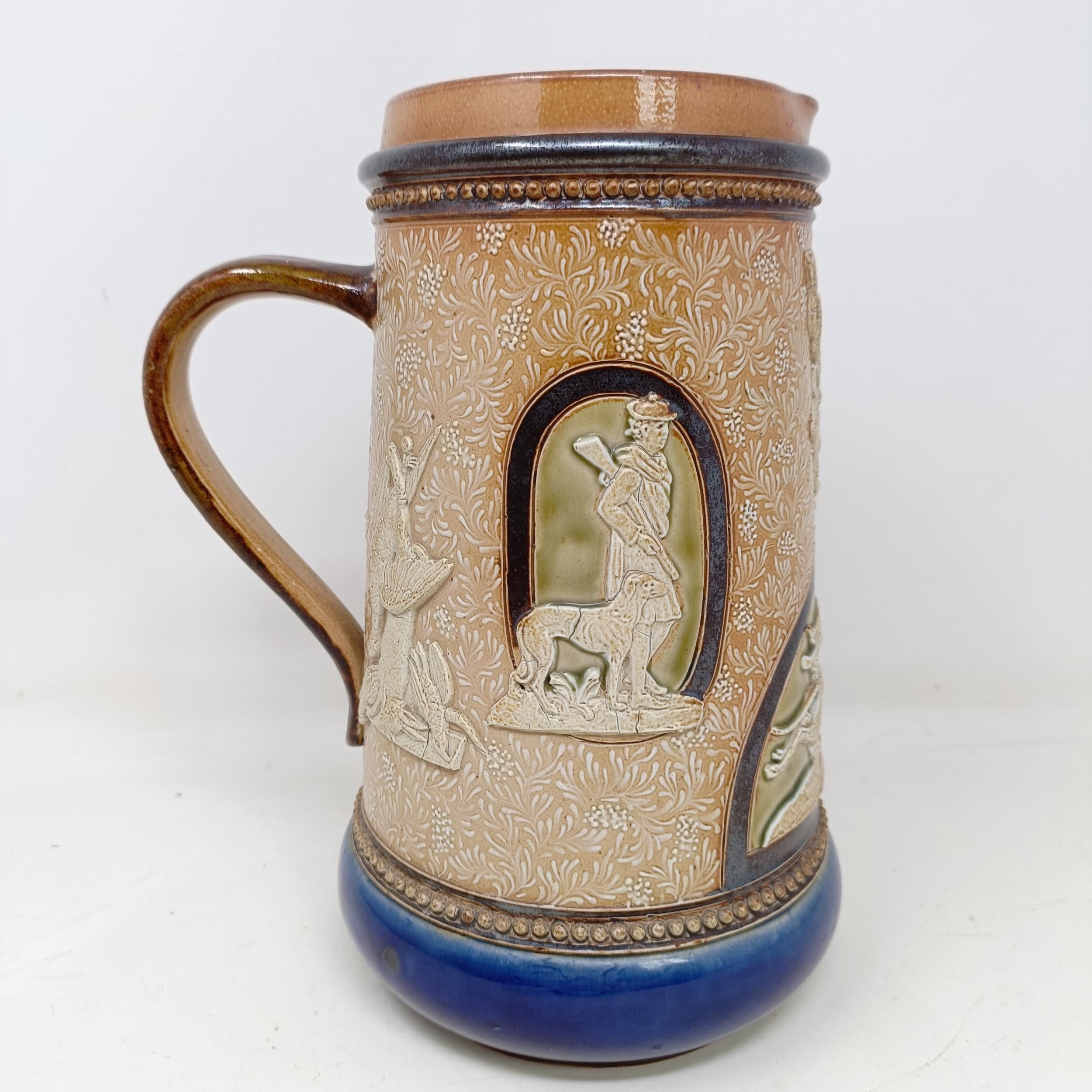 A Doulton Lambeth jug, by Harriet Hibbut, decorated hunting scenes, 22 cm high No chips, cracks or - Image 3 of 7