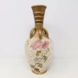 A Doulton Burslem vase, decorated with flowers, 30 cm high
