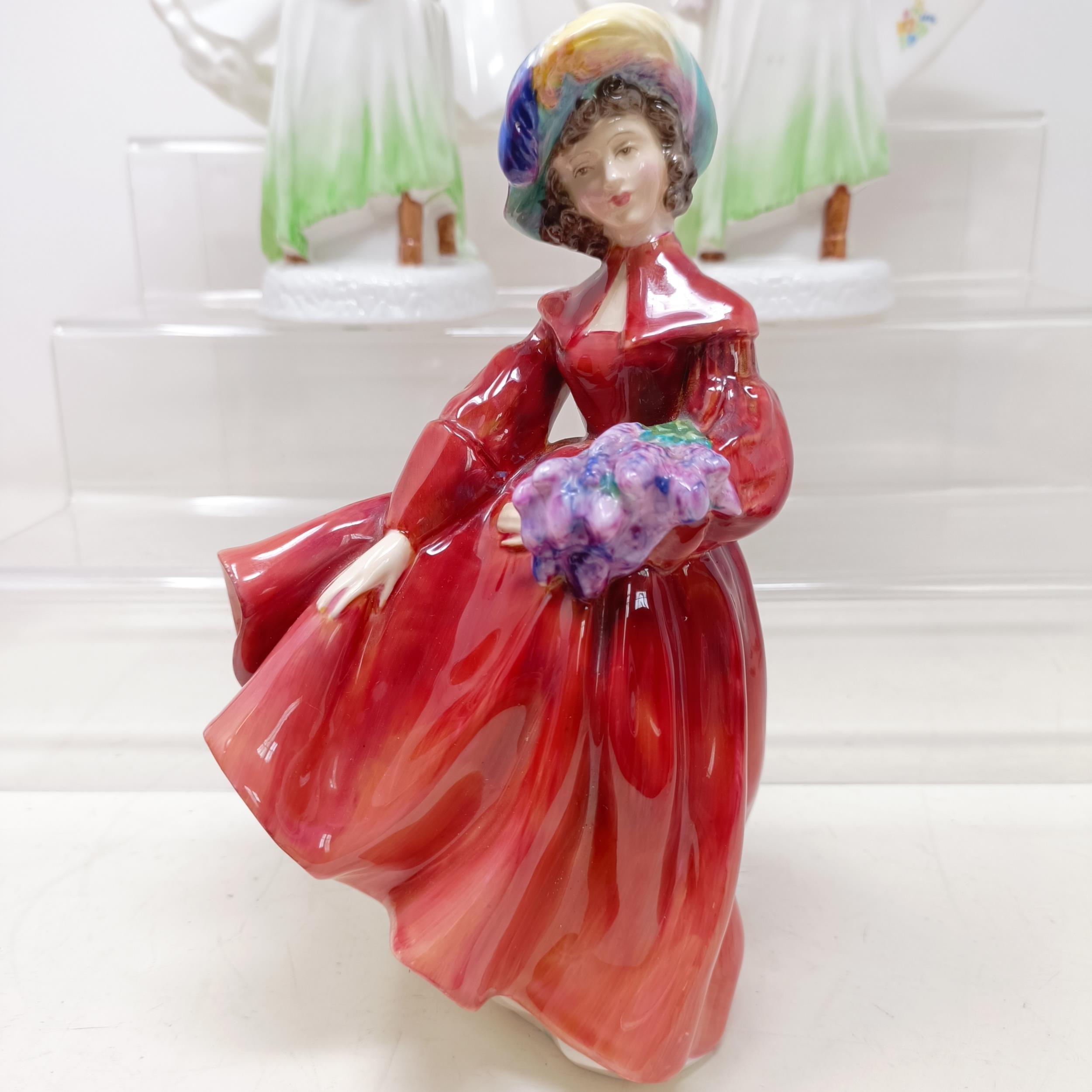 A Royal Doulton figure, Gwynneth Lilac Time HN2137, Faith HN3082, Winter Welcome HN3611, And One For - Image 17 of 30