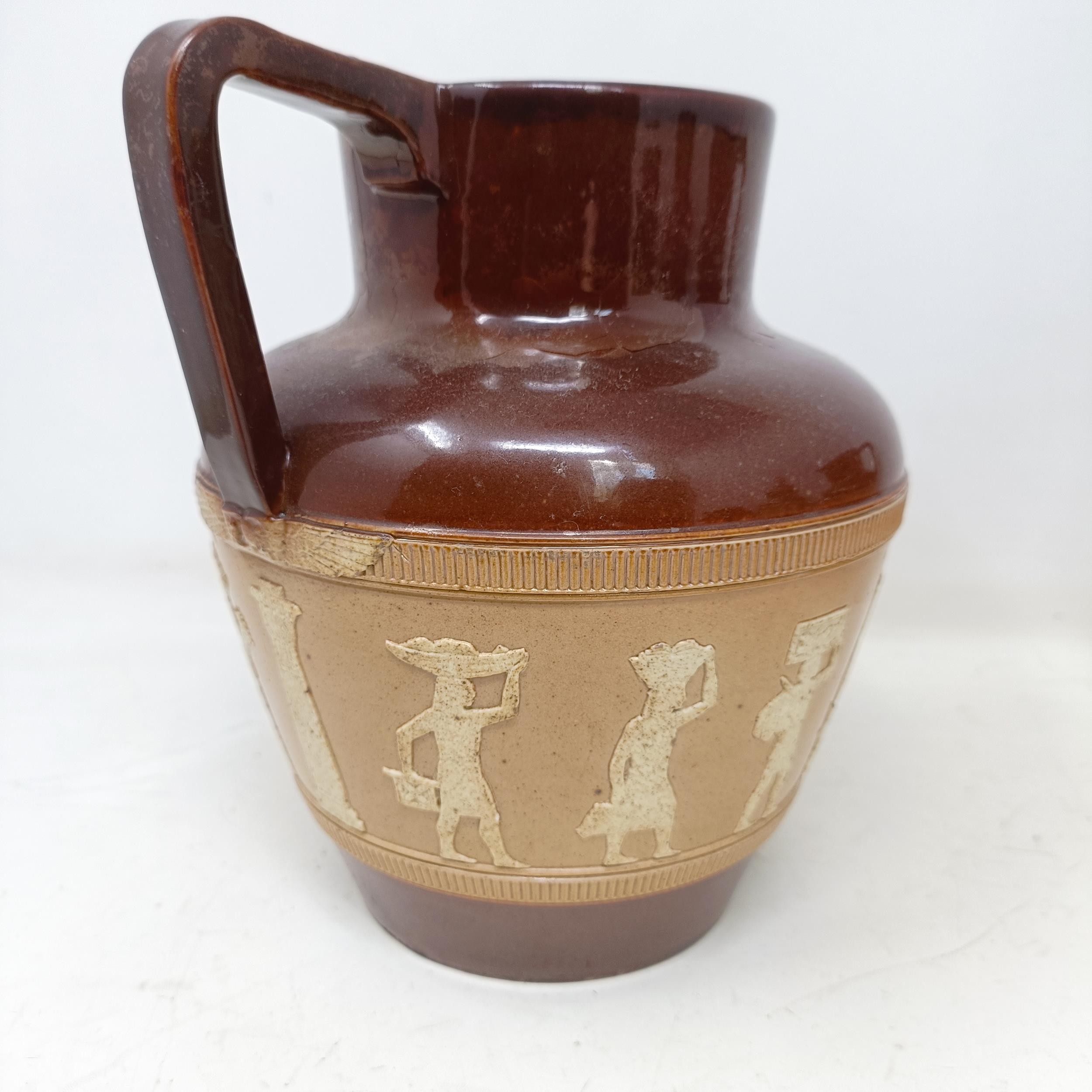 A graduated set of Doulton Lambeth jugs, 20 cm, 18 cm and 14 cm, and another similar, 18 cm (4) - Image 18 of 25