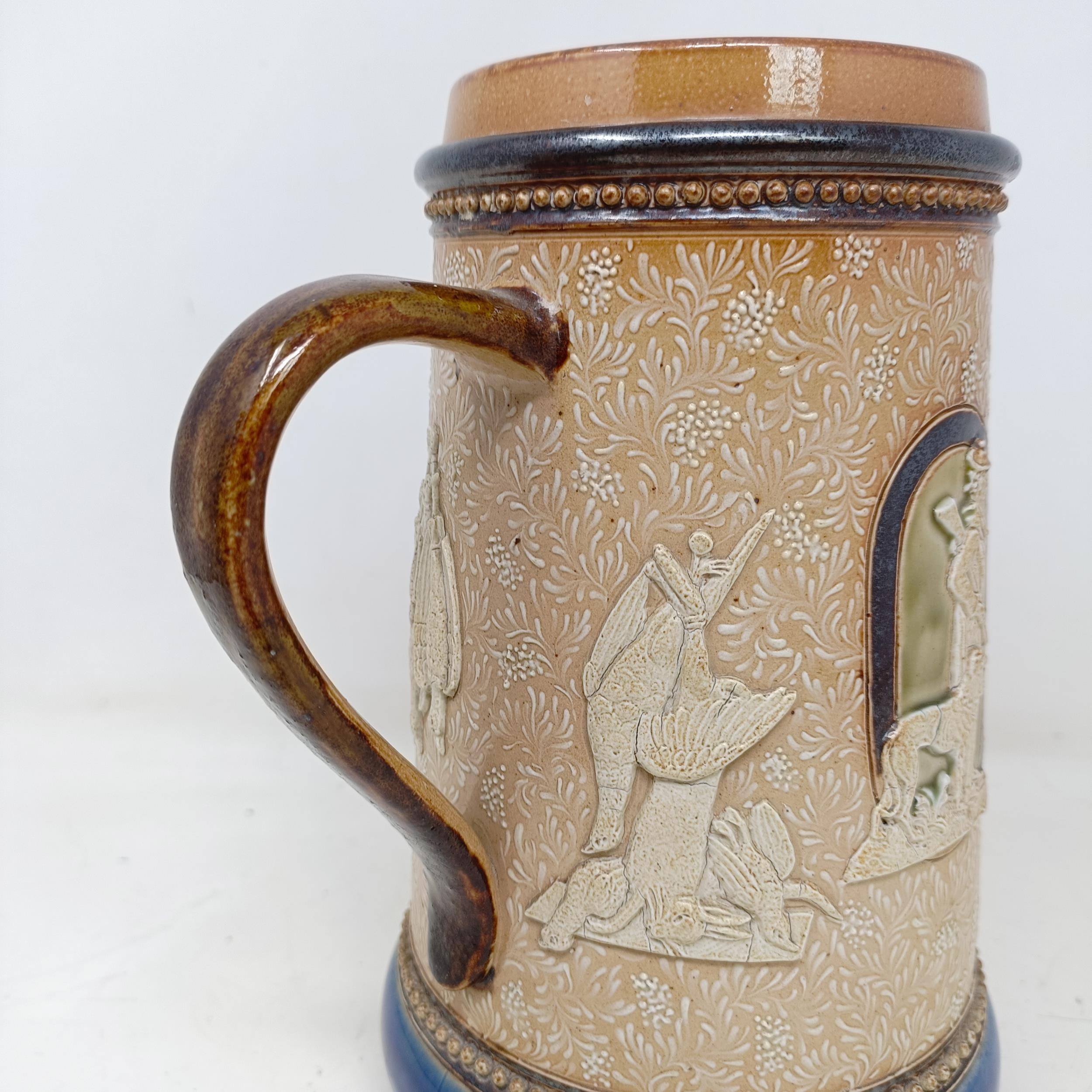 A Doulton Lambeth jug, by Harriet Hibbut, decorated hunting scenes, 22 cm high No chips, cracks or - Image 4 of 7