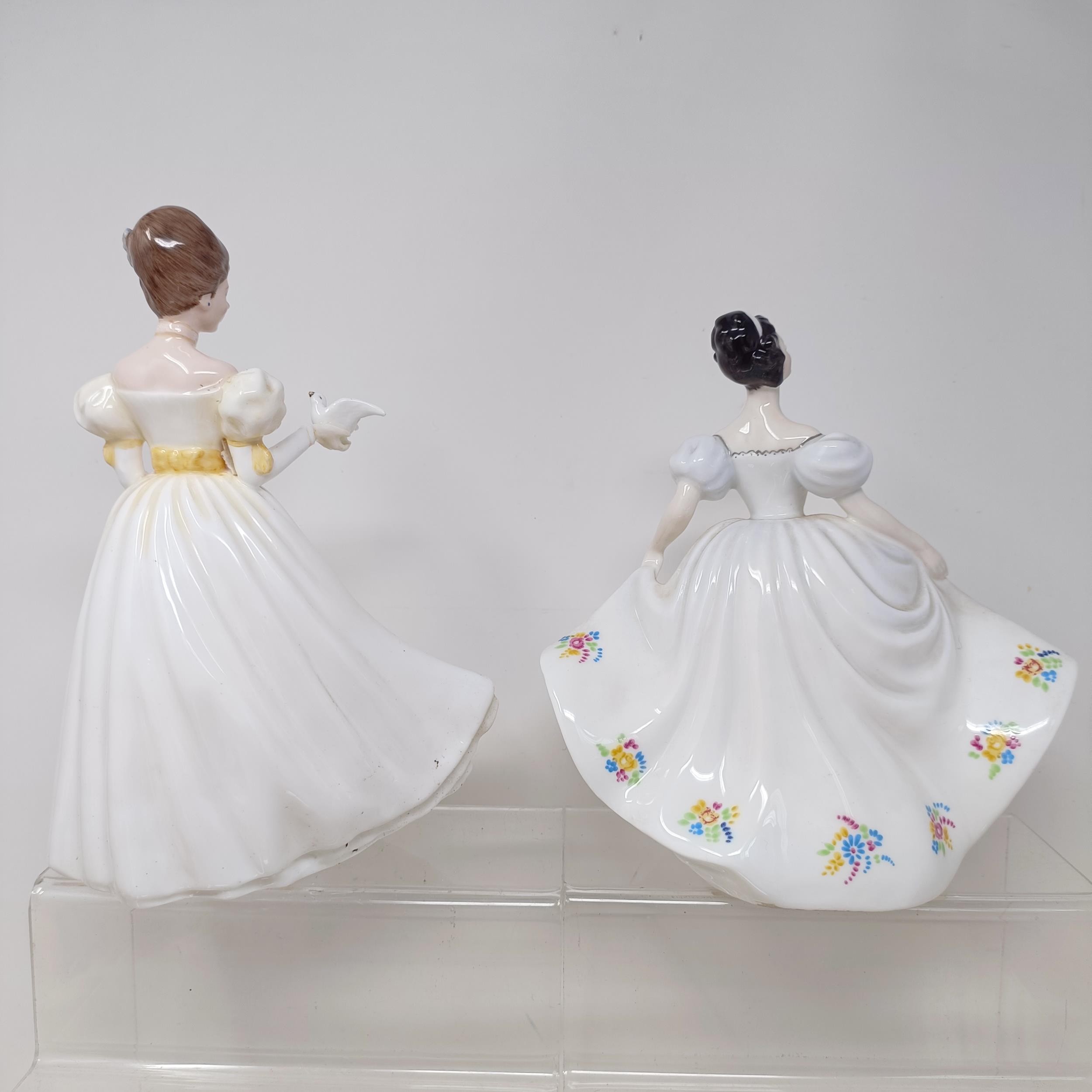 A Royal Doulton figure, Gwynneth Lilac Time HN2137, Faith HN3082, Winter Welcome HN3611, And One For - Image 28 of 30