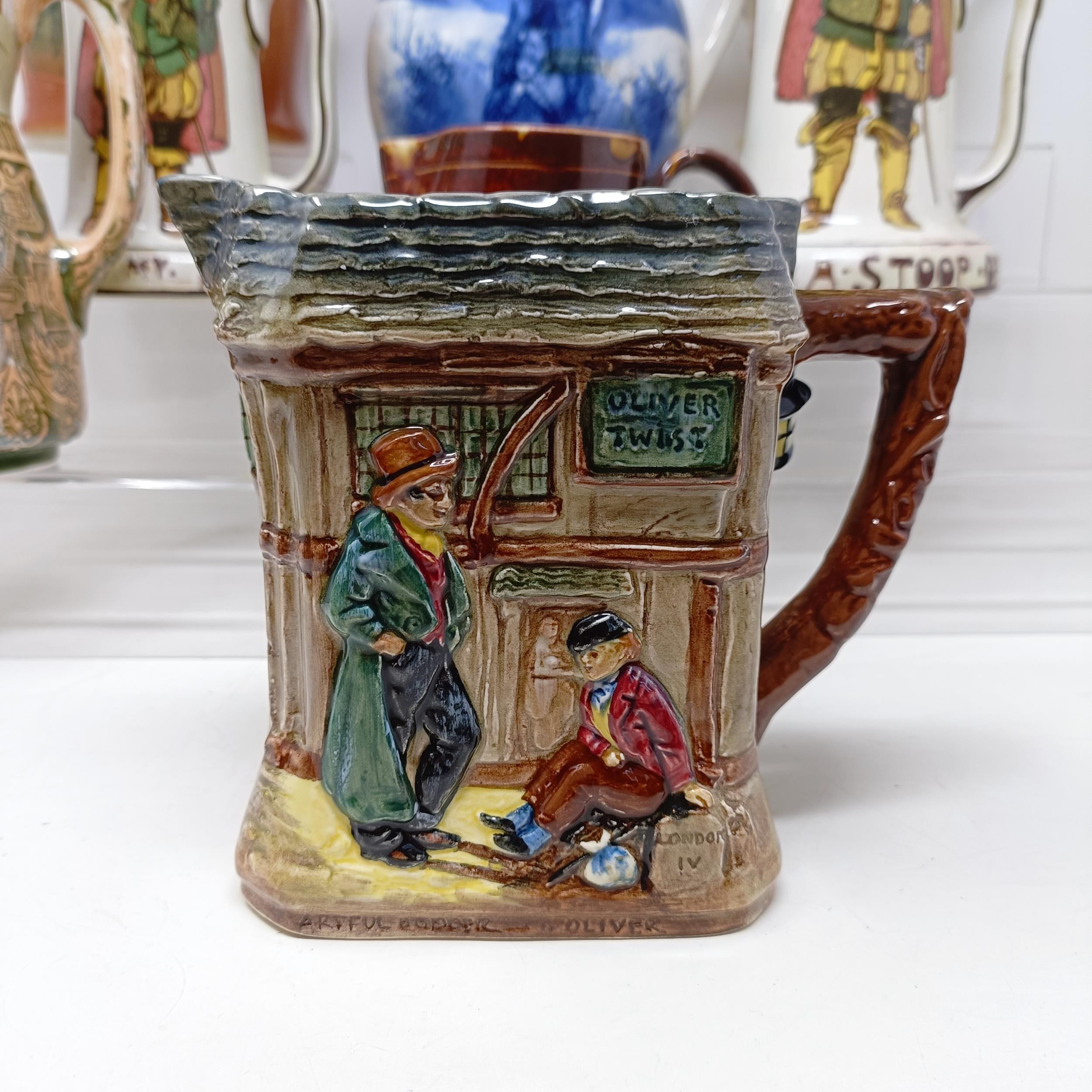 A Royal Doulton jug, decorated figure, 21 cm high, a Royal Doulton jug, Oliver Twist D5617, and - Bild 8 aus 45