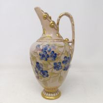 A Doulton Lambeth jug by Frank A Butler, decorated flowers, highlighted in gilt, 26 cm high good
