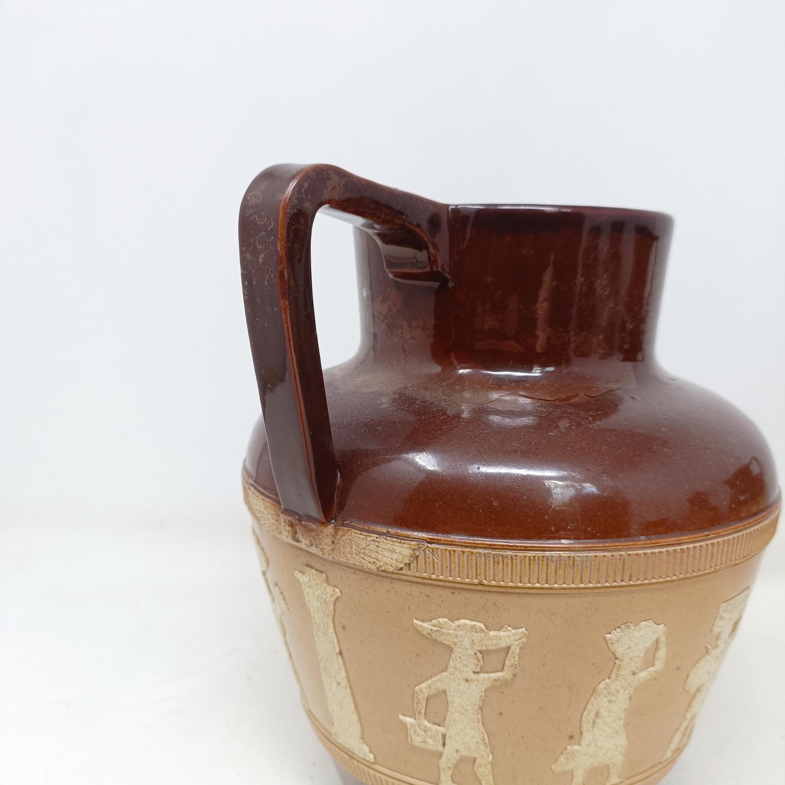 A graduated set of Doulton Lambeth jugs, 20 cm, 18 cm and 14 cm, and another similar, 18 cm (4) - Image 17 of 25