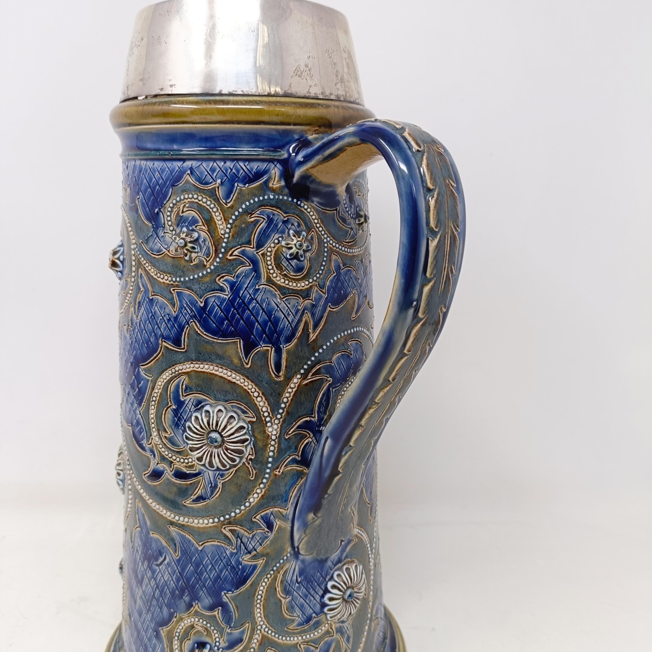 A Doulton Lambeth jug, by George Tinworth, decorated floral motifs, with a silver mount, marks - Image 3 of 11