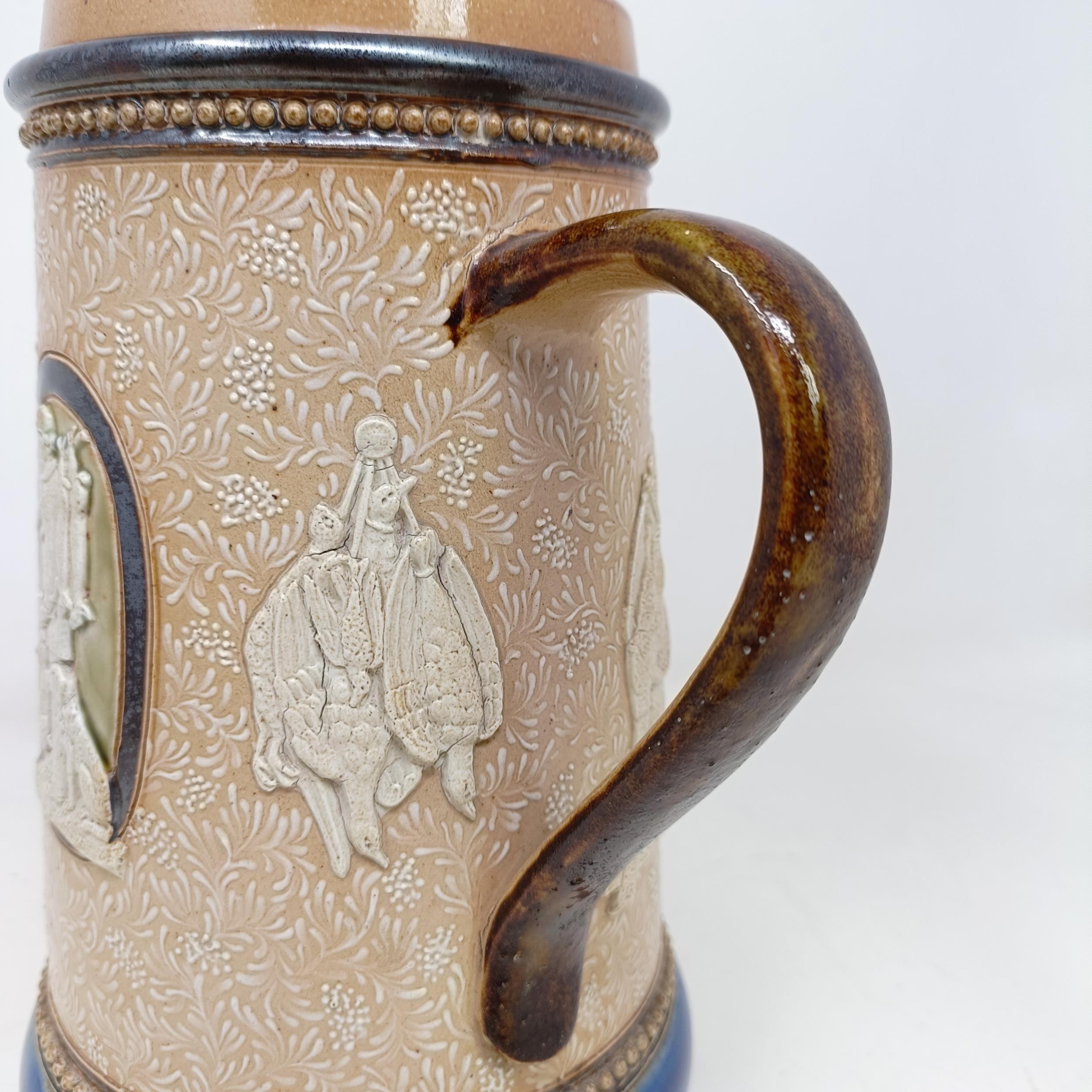 A Doulton Lambeth jug, by Harriet Hibbut, decorated hunting scenes, 22 cm high No chips, cracks or - Image 5 of 7