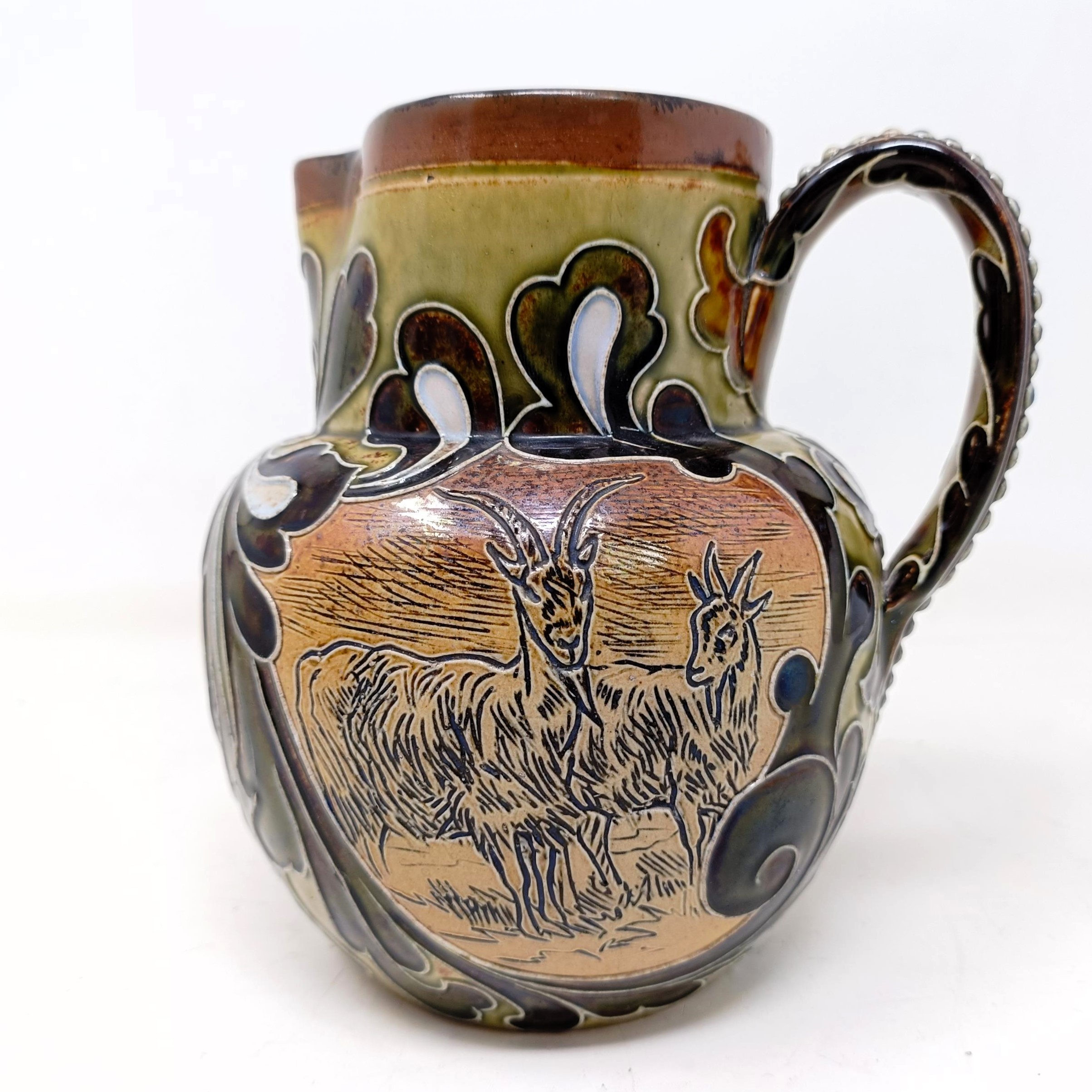 A Doulton Lambeth jug, by Hannah Barlow, decorated goats, 17 cm high No chips, cracks or restoration - Image 2 of 7