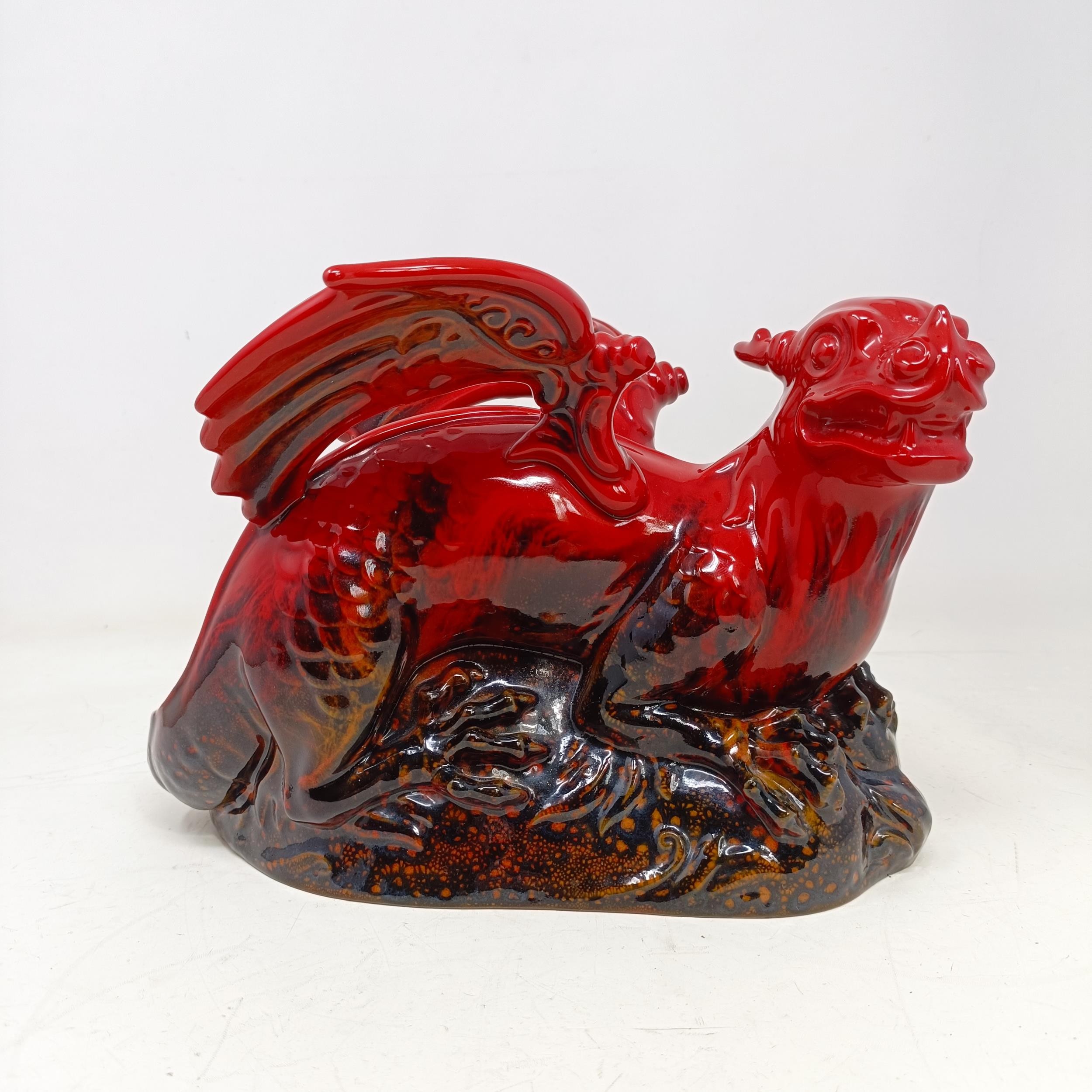 A Royal Doulton Flambé dragon, 30 cm wide looks and feels good