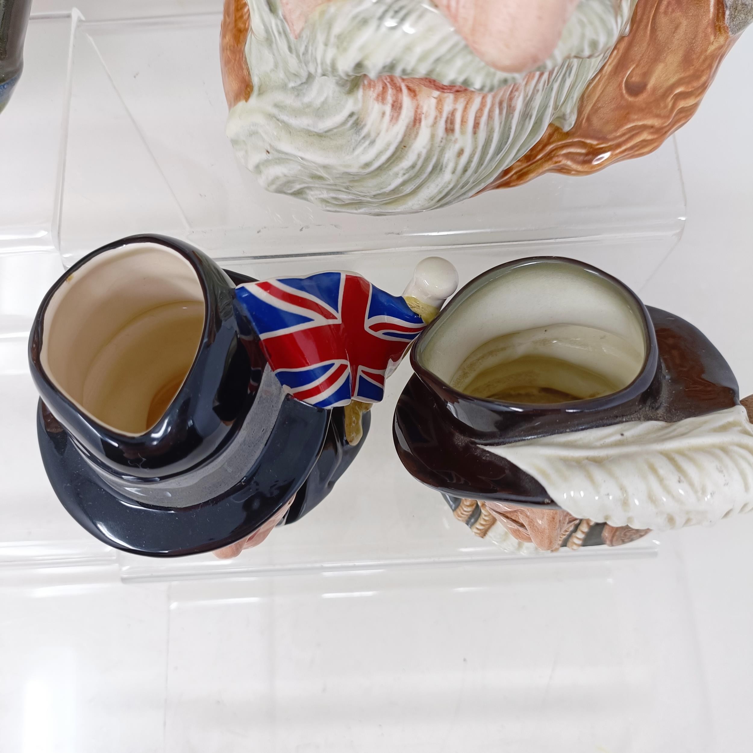 A Royal Doulton character jug, Robinson Crusoe D6532, Beefeater D6206, a Royal Doulton figure, The - Image 25 of 35