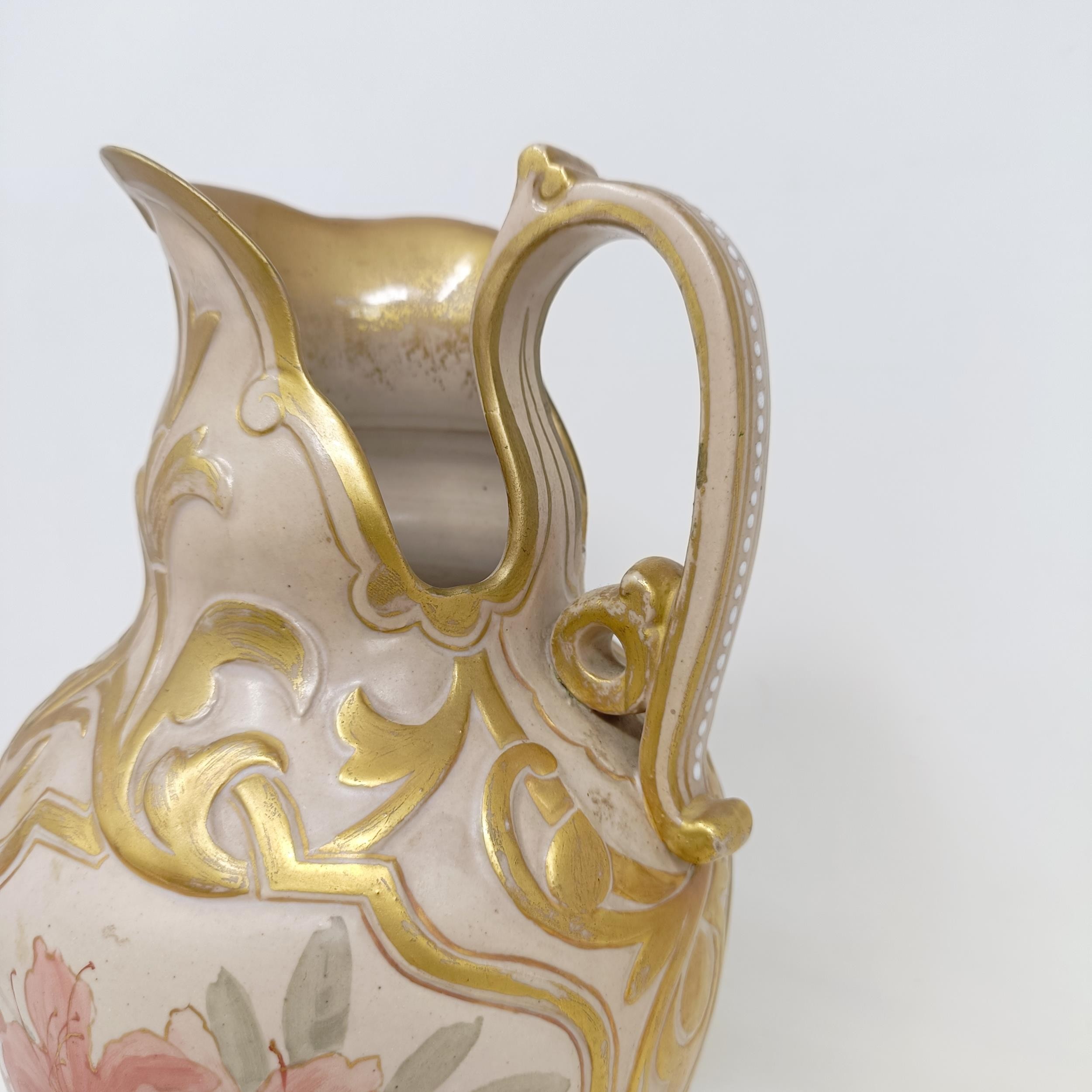 A Doulton Lambeth ewer, by Frank A Butler, decorated with flowers, highlighted in gilt, 30 cm high - Image 3 of 7