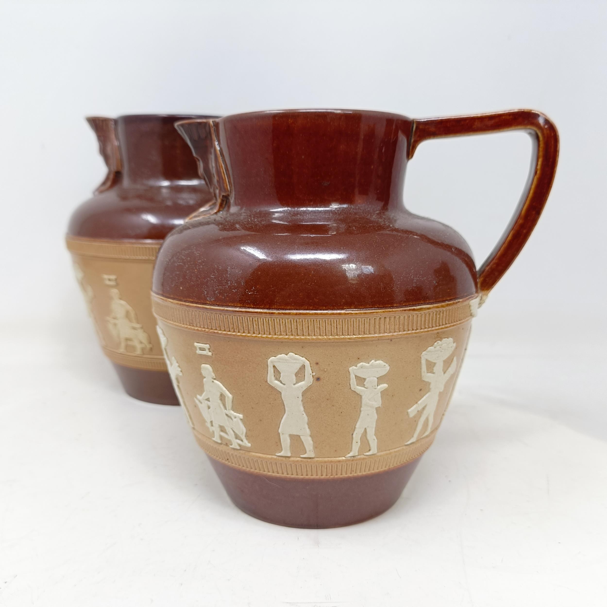 A graduated set of Doulton Lambeth jugs, 20 cm, 18 cm and 14 cm, and another similar, 18 cm (4) - Image 11 of 25