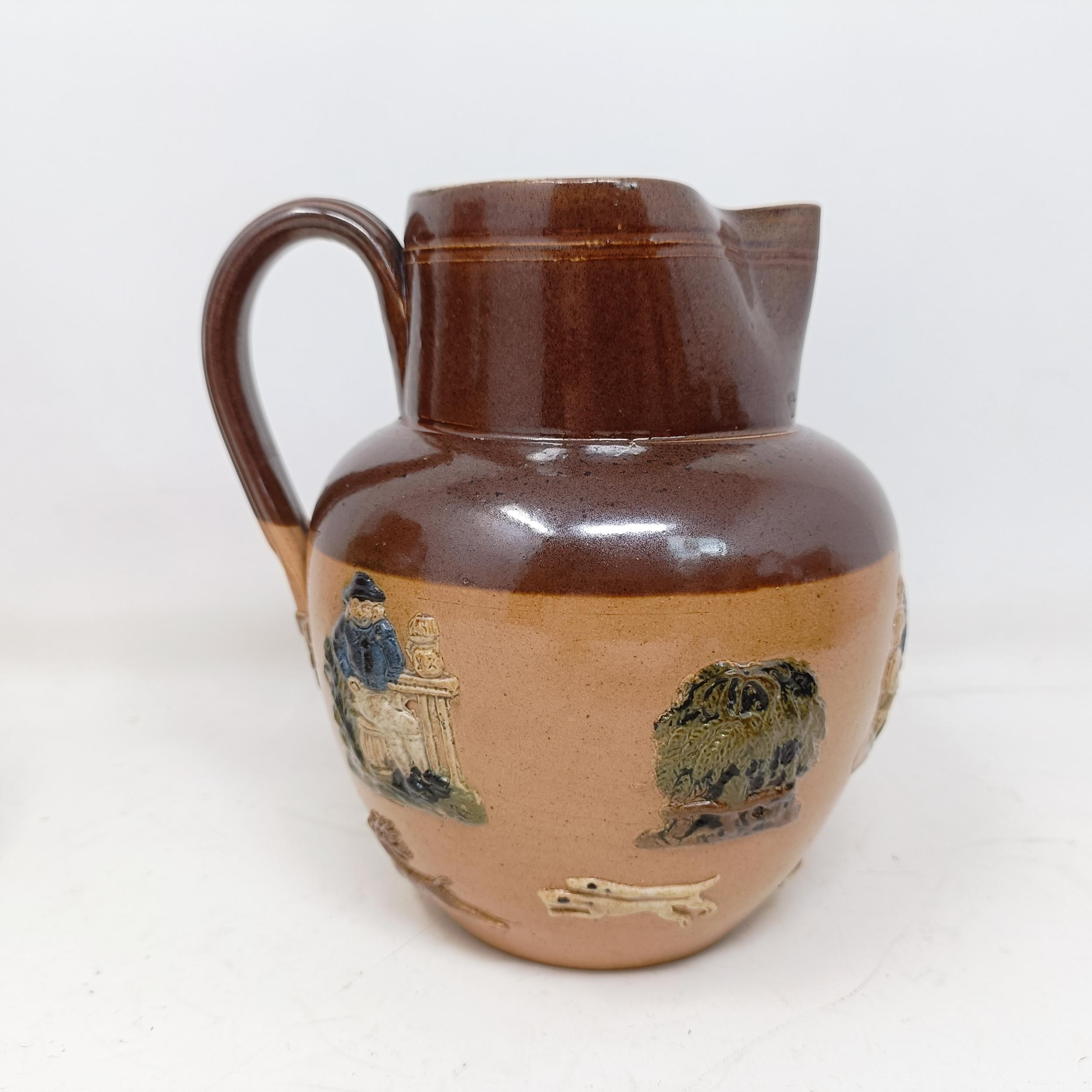A Doulton Lambeth jug, with a motto, 'For Every Ill Beneath The Sun There Is A Remedy Or None...' 18 - Image 23 of 27