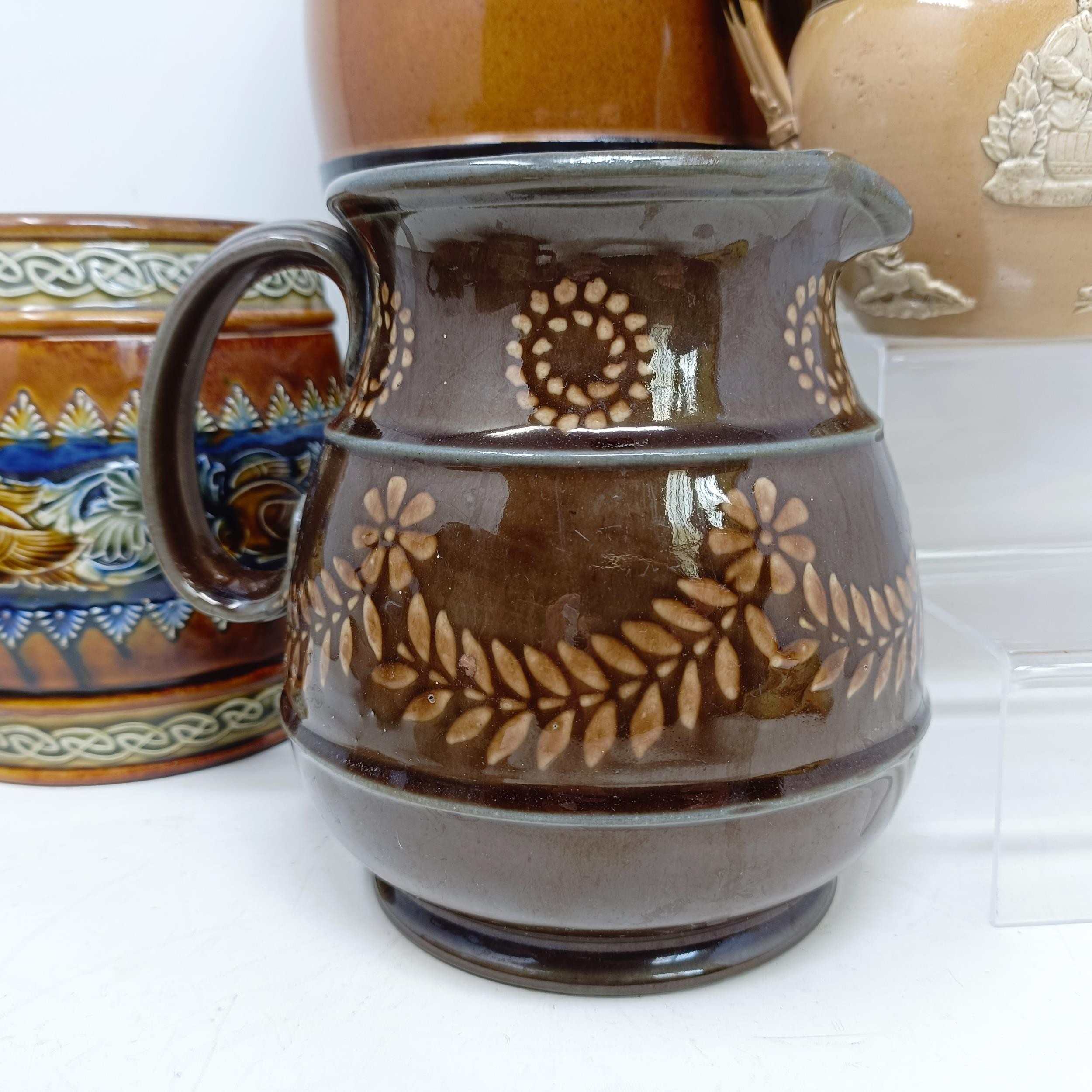 A Doulton Lambeth stoneware barrel, reading Pedestrian Barrelette, 22 cm high, a vase, lacking - Image 17 of 42