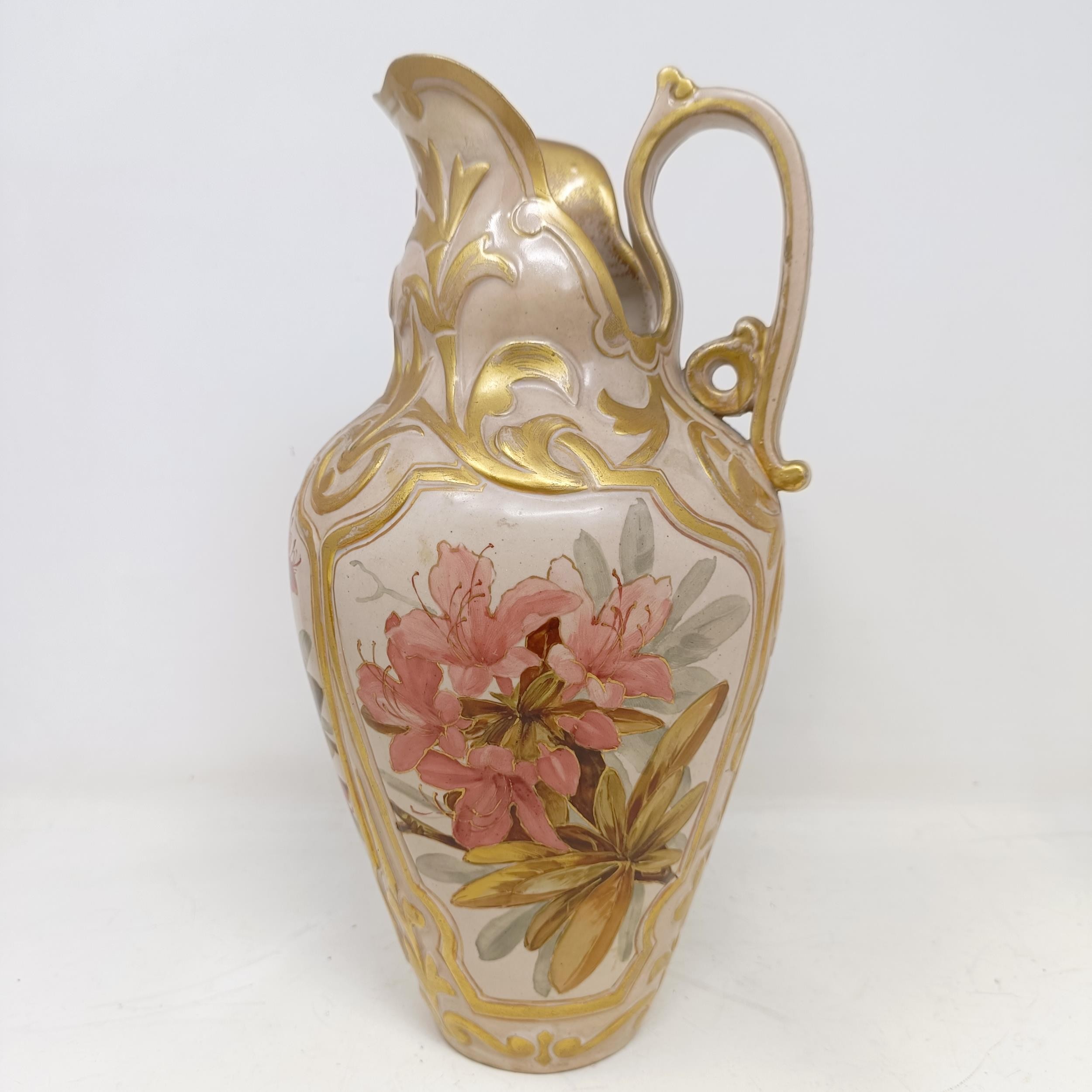 A Doulton Lambeth ewer, by Frank A Butler, decorated with flowers, highlighted in gilt, 30 cm high - Image 2 of 7