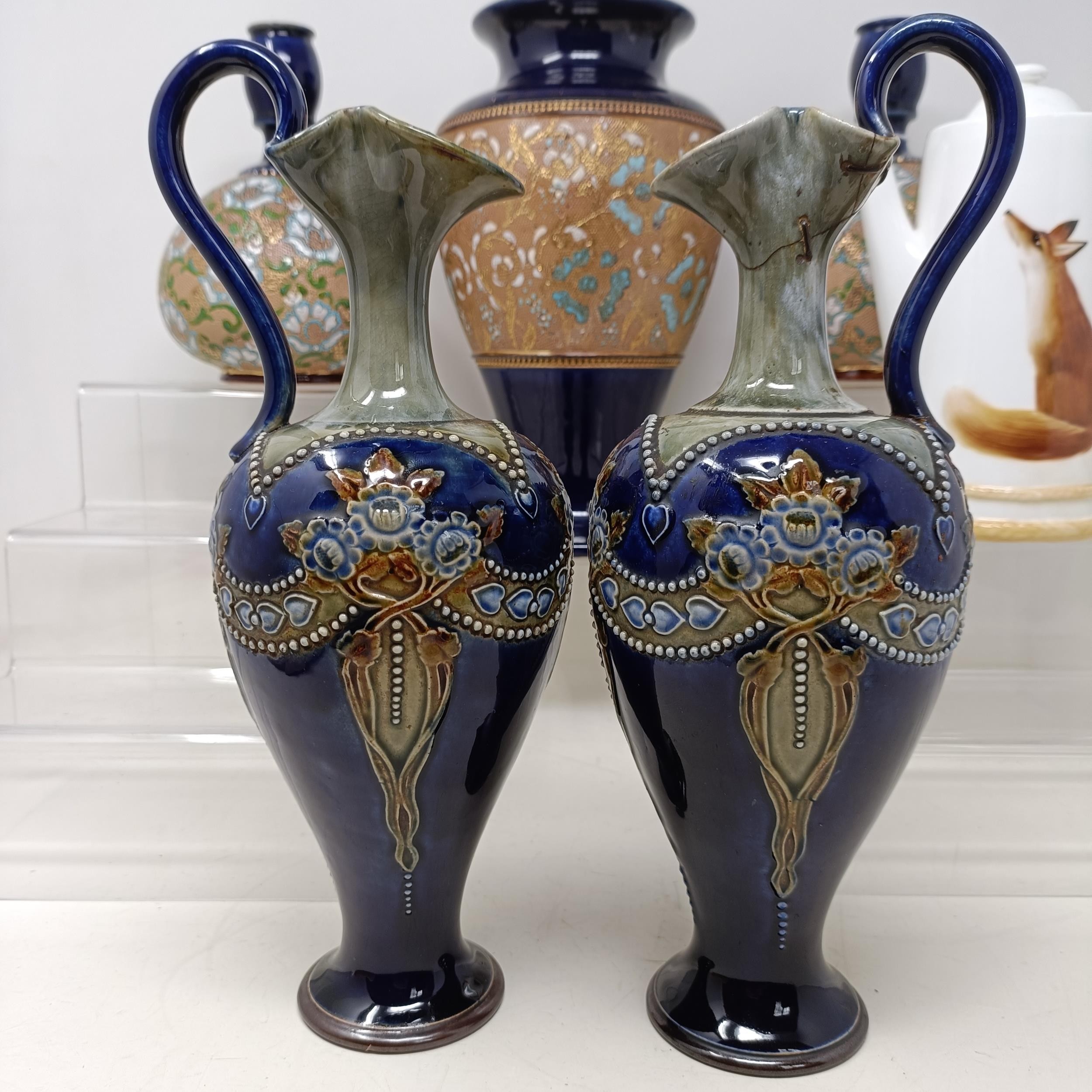 A pair of Royal Doulton ewers, 29 cm high, a Royal Doulton vase, 24 cm high, a pair of Royal Doulton - Image 21 of 44
