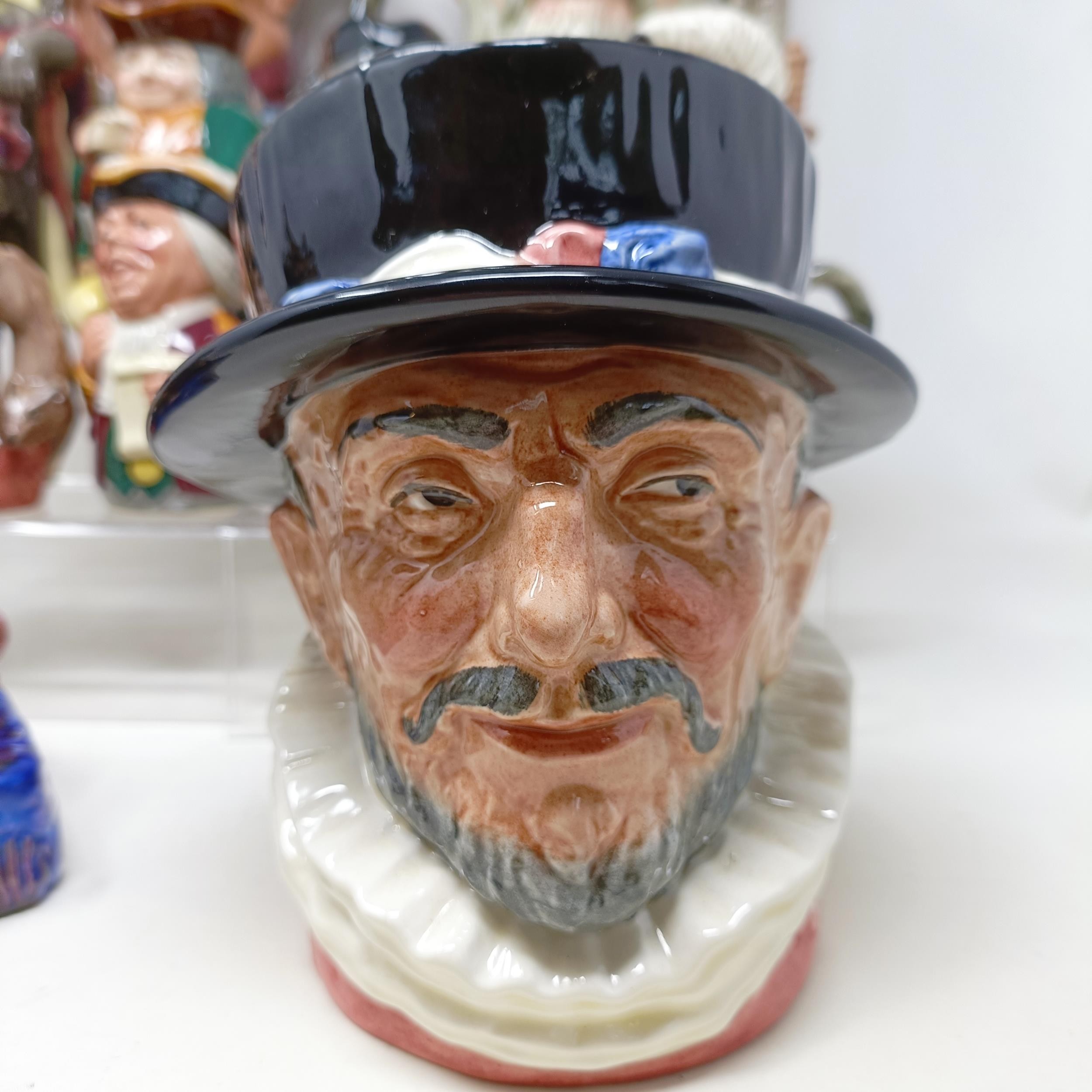A Royal Doulton character jug, Robinson Crusoe D6532, Beefeater D6206, a Royal Doulton figure, The - Image 2 of 35