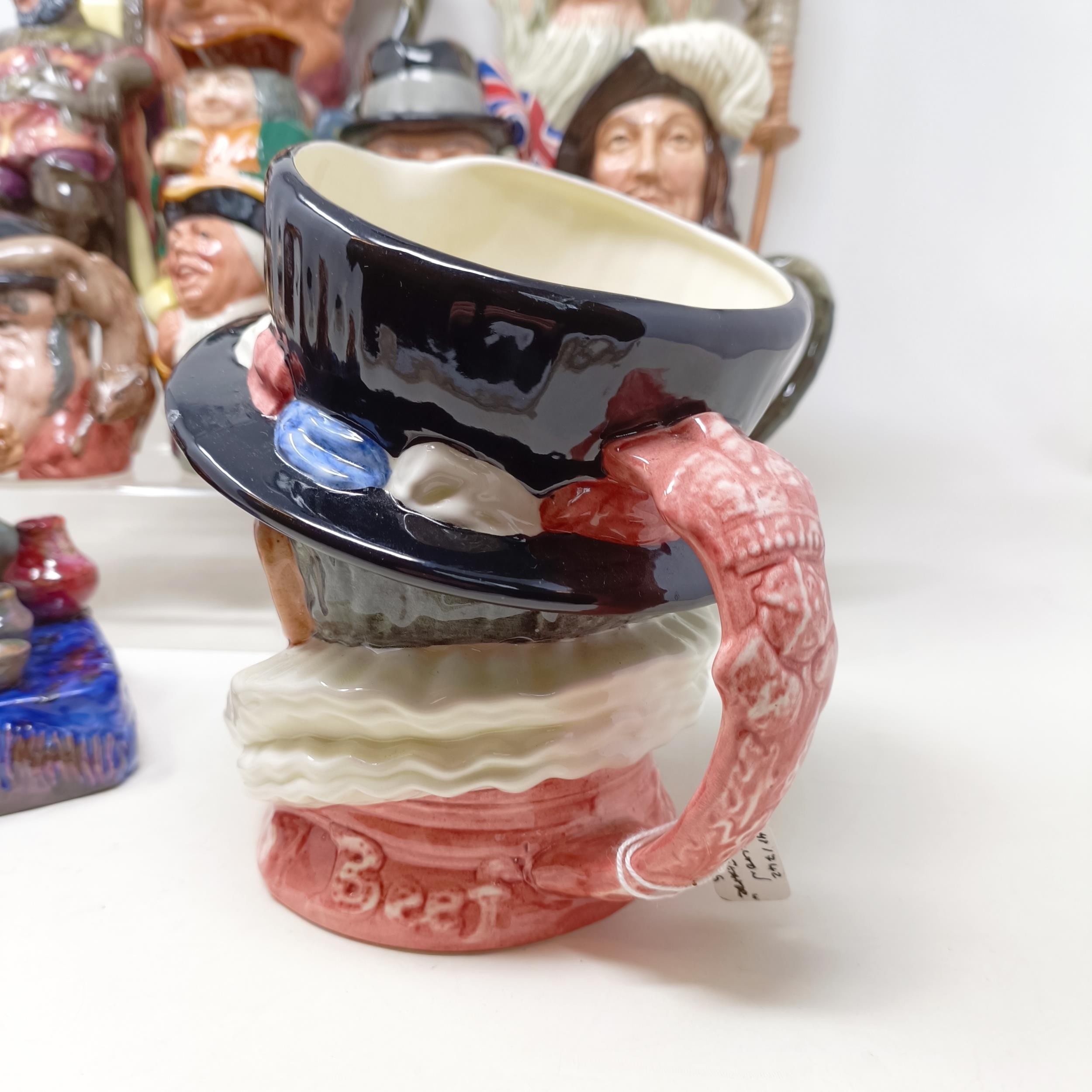 A Royal Doulton character jug, Robinson Crusoe D6532, Beefeater D6206, a Royal Doulton figure, The - Image 3 of 35