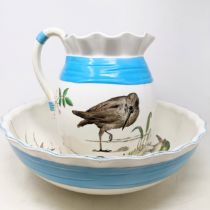 A Minton jug and bowl set, decorated birds (2)