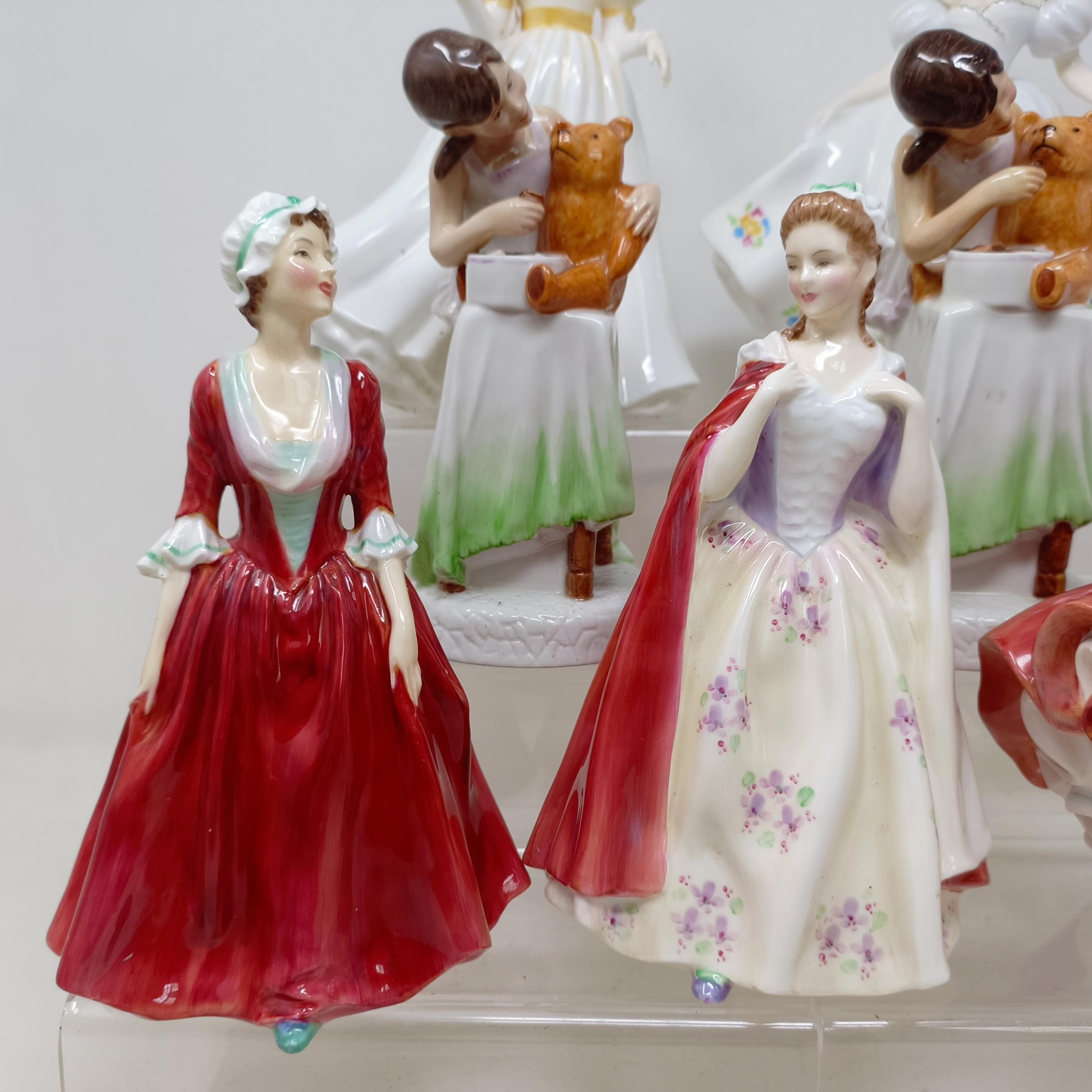 A Royal Doulton figure, Gwynneth Lilac Time HN2137, Faith HN3082, Winter Welcome HN3611, And One For - Image 13 of 30