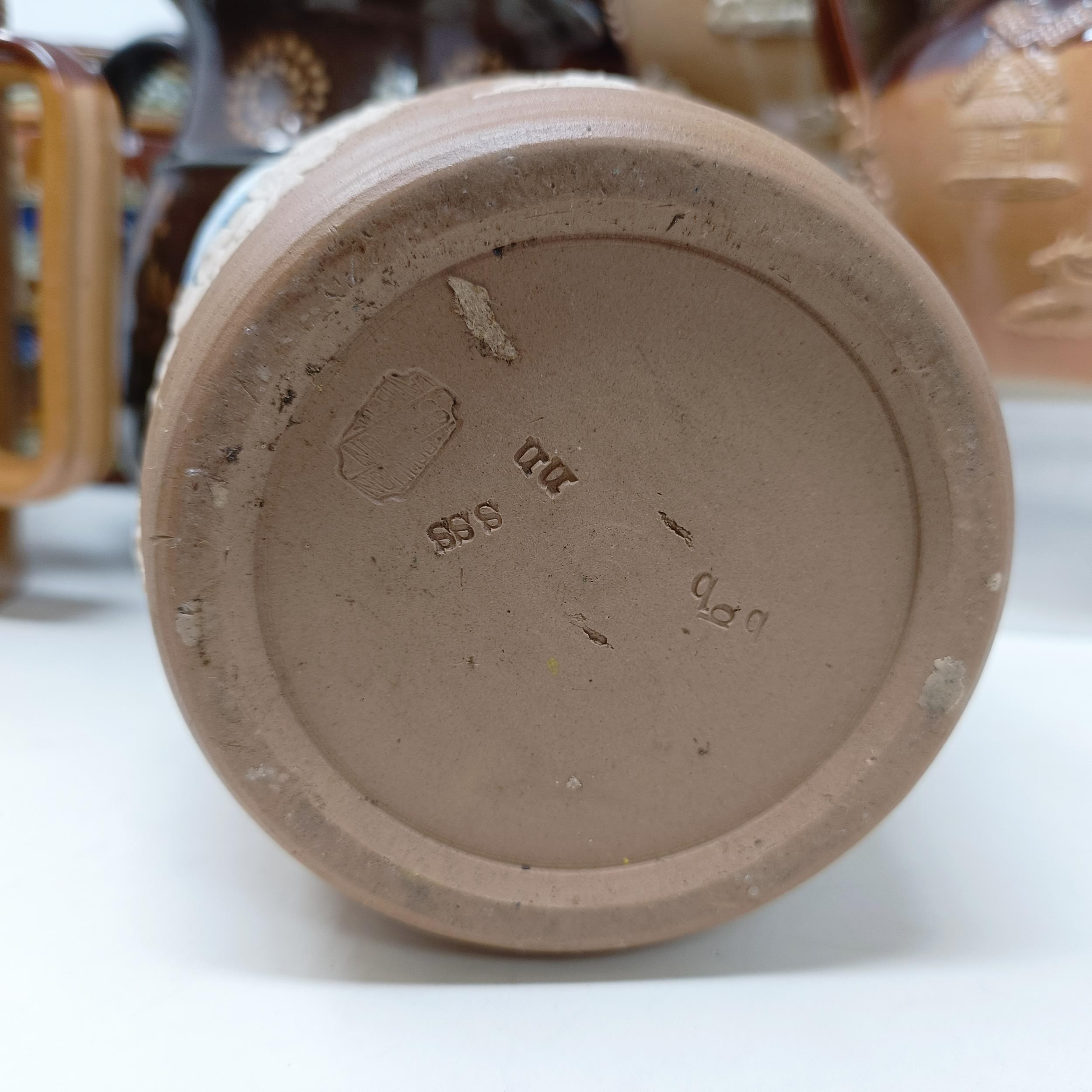 A Doulton Lambeth stoneware barrel, reading Pedestrian Barrelette, 22 cm high, a vase, lacking - Image 6 of 42