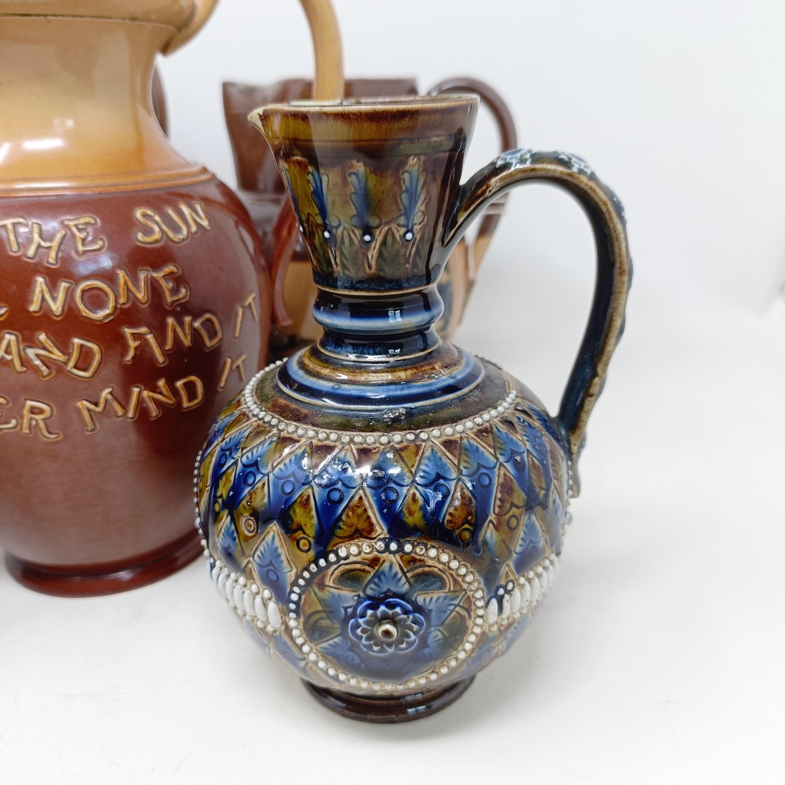 A Doulton Lambeth jug, with a motto, 'For Every Ill Beneath The Sun There Is A Remedy Or None...' 18 - Image 2 of 27