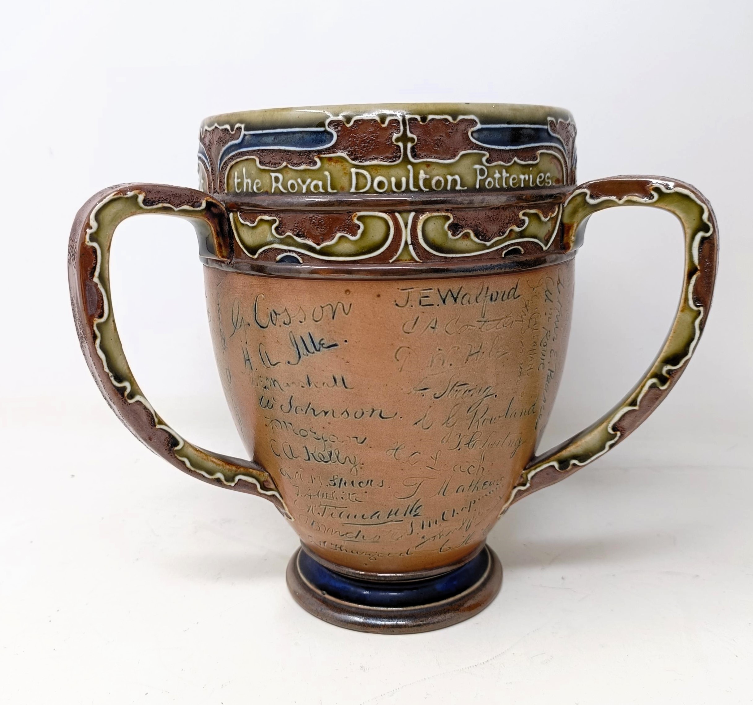 A Royal Doulton three handled retirement loving cup, by Mark Marshall, with various signatures of
