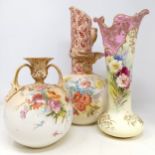 A Doulton Burslem ewer, decorated flowers, 34 cm high, a vase, 28 cm high, a twin handled vase, 18