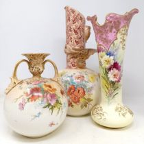 A Doulton Burslem ewer, decorated flowers, 34 cm high, a vase, 28 cm high, a twin handled vase, 18